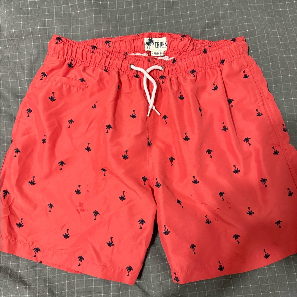 Vibrant Red Swim Trunks with Palm Tree Design